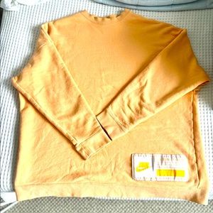 Nike Women’s Engineered Champions Crew Sweatshirt, Oversized, Creamsicle, Small